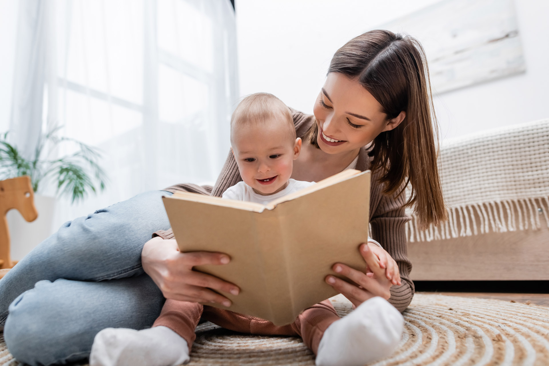Mom Reading to Child Increasing Infant Developmental Milestones