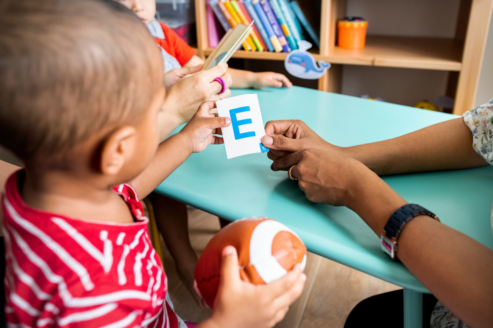 preschool child learning letters